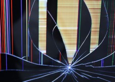 Hito Steyerl, Strike (2010). Installation with 46''-flatscreen mounted on two free standing poles video, HDV, 28 sec. Copyright Hito Steyerl, courtesy Wilfried Lentz Rotterdam.